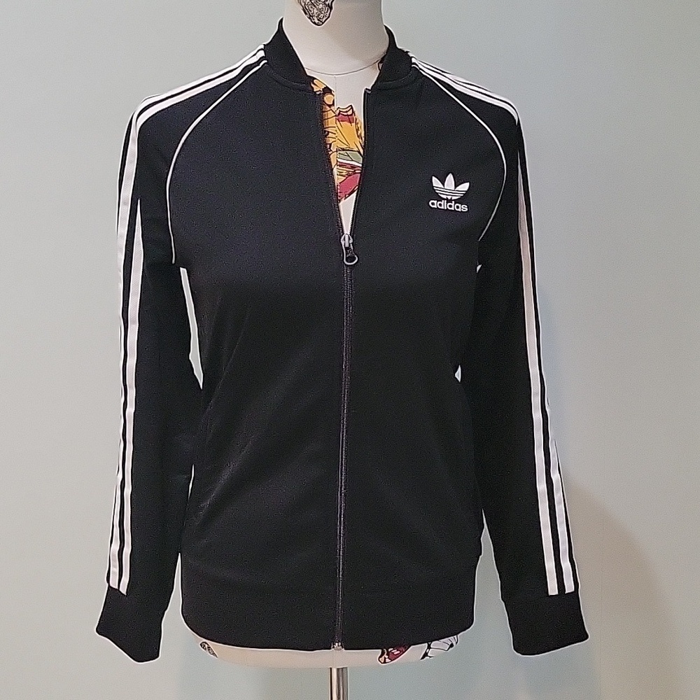 Vintage ADIDAS jogger full zip jacket.  Stripes down the sleeves.   Classic